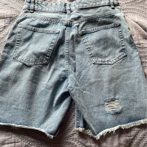light blue jean shorts, torn fabric - Picture 3 of 3